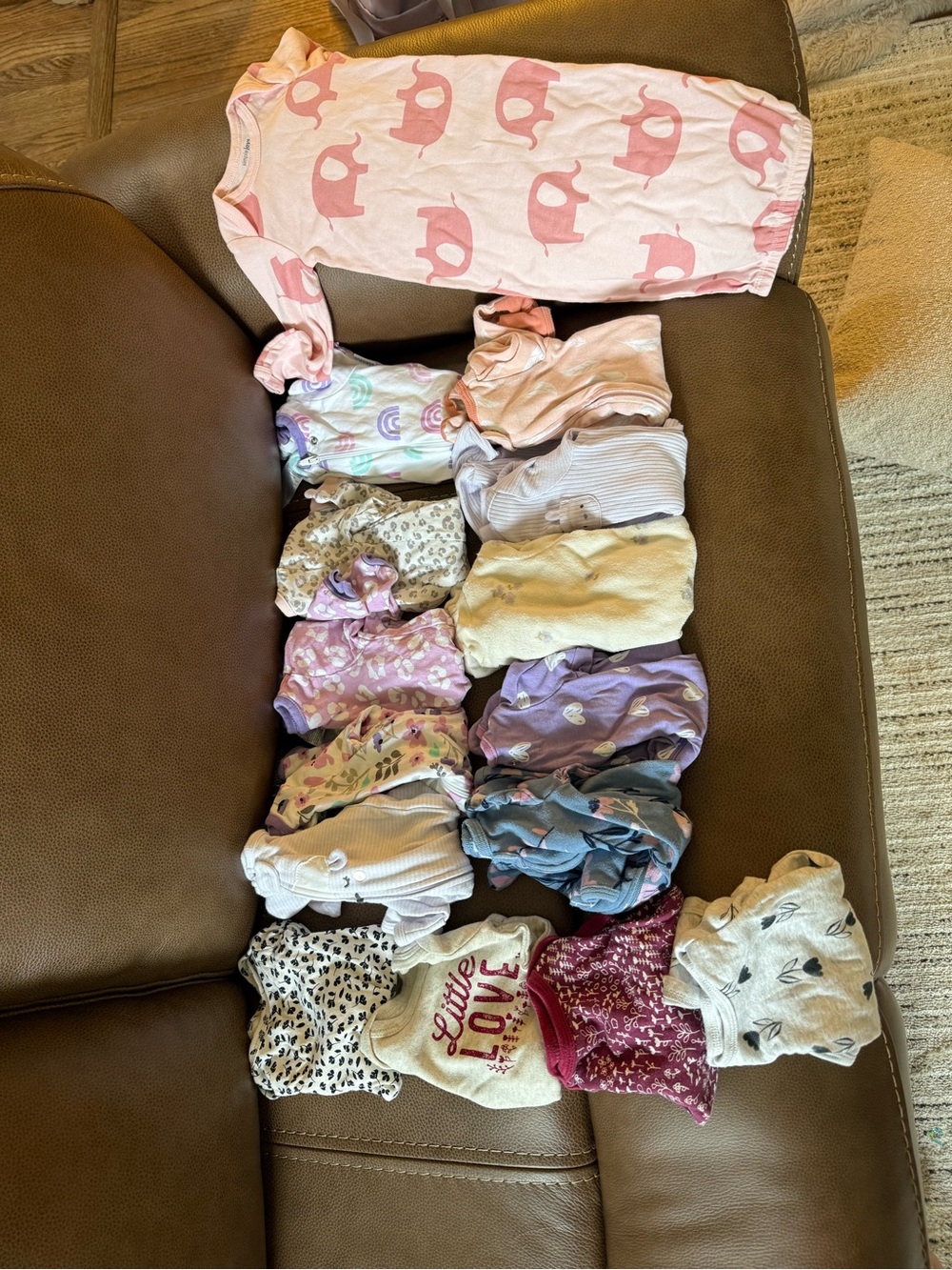 Baby Sleeper and 10 Assorted Footed Pajamas and 4 onesies all Newborn
